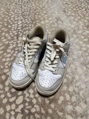 Women’s Light Blue and White Nike Dunk.